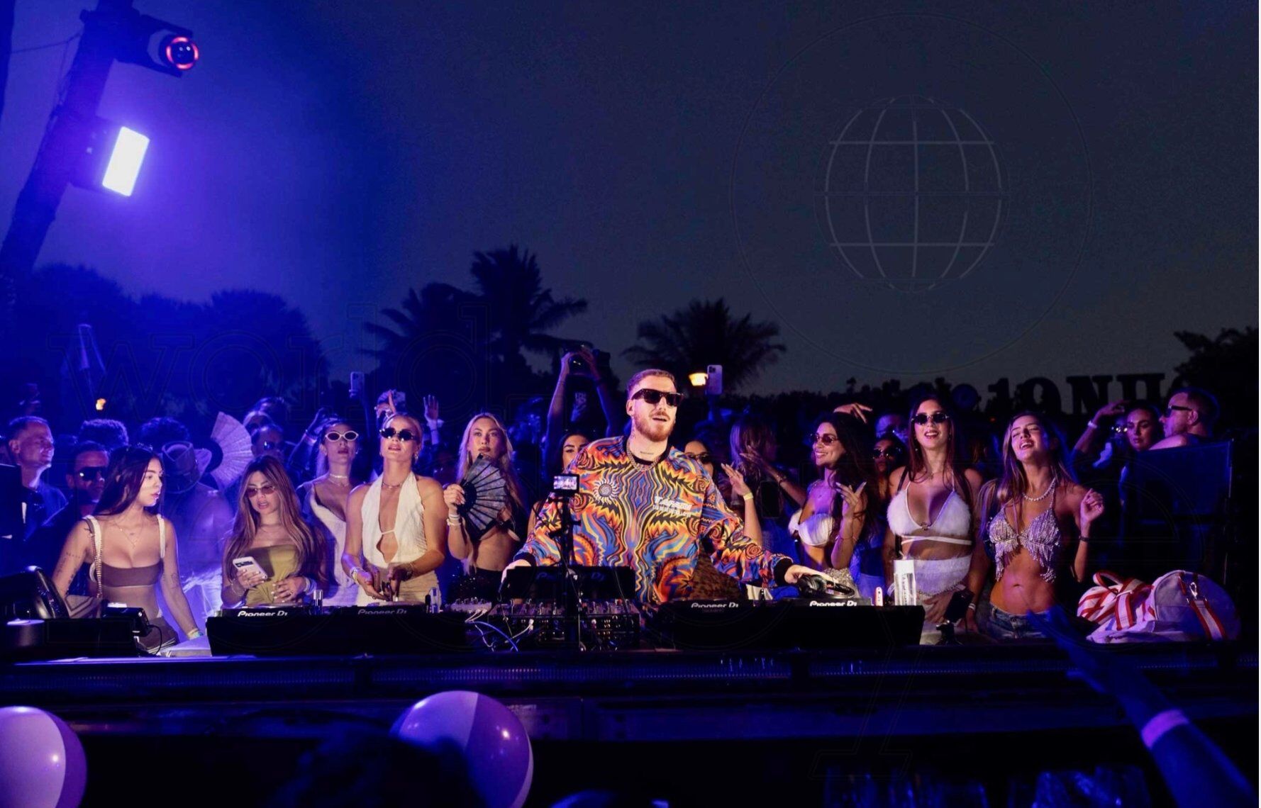 Headline DJ set under blue stage lights